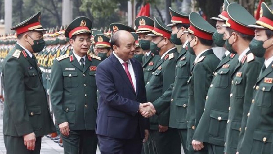 President urges stronger development of Vietnamese military science, art and culture